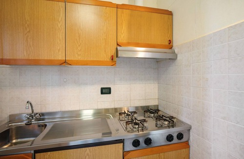 Lavina Apartment | Studio Apartment "Monolocale La Pineta 46" with Shared Pool, Private Terrace & Wi-Fi