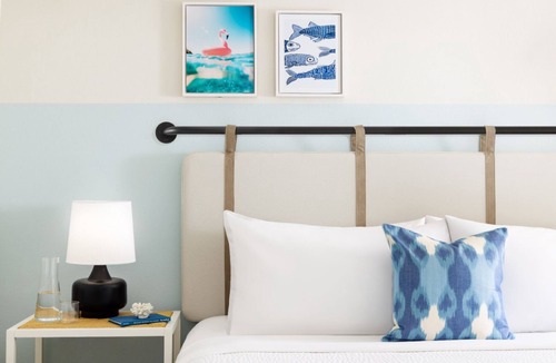 New Town Hotel | Sun, Sip, & Socialize | Island Stay w/2 Pools & Backyard Bash