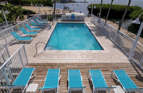 Islamorada Apartment | Swim with Dolphins in the Florida Keys! FREE Breakfast & Parking, Marina, Pool!