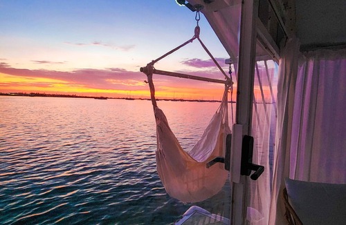 Meadows Boat Rental | The Crystalmarine Suite – Rustic Luxury on the Sea