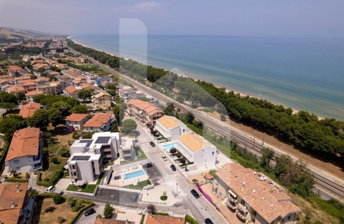 Foggetta Apartment | The recently-built Résidence Cerrano Park consists of two buildings with 12 three-room apartments, and offers guests the unique opportunity to have breakfast while enjoying a breathtaking view of the m