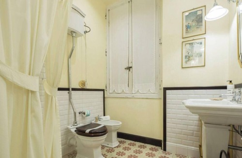 Quinto al Mare Villa | The Riviera apartment, located on the ground floor of Villa Aranci in Via Fabio Filzi 2B, Genoa, offers an elegant and comfortable stay in an exclusive setting.With a private entrance, double bedroom, living area, private bathroom, and direct access to t