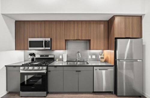 West Gateway Apartment | Top-Floor Gem & Heated Pool Walk to Attractions