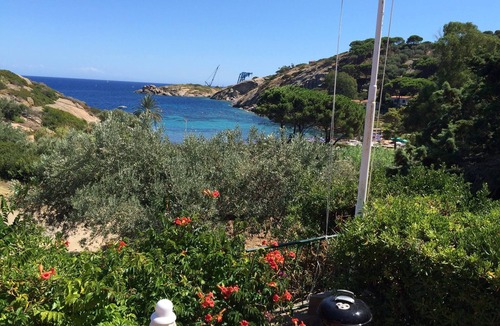 Arenella Villa | Top floor in a stunning villa on the sea with panoramic terrace and tennis court
