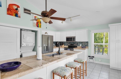 Sugarloaf Shores House | Tropical paradise on canal in Lower Keys-pool, tiki, firepit, dock, dog friendly