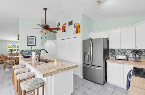 Sugarloaf Shores House | Tropical paradise on canal in Lower Keys-pool, tiki, firepit, dock, dog friendly