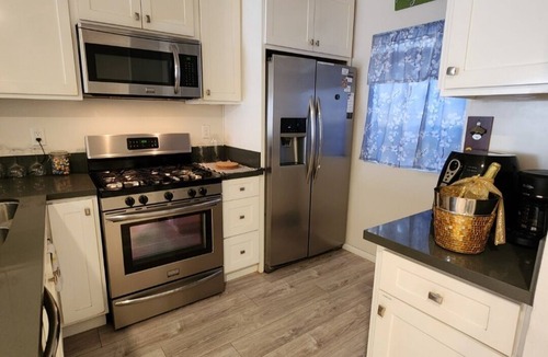 Harbor House | Two Bedroom Townhouse Lakewood, Ca with fireplace, pool, jacuzzi