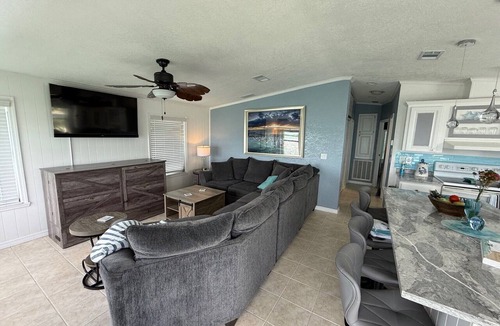 Cudjoe Key House | TWO HOMES A MID Rise and High Rise 85ft of Sea Wall.
