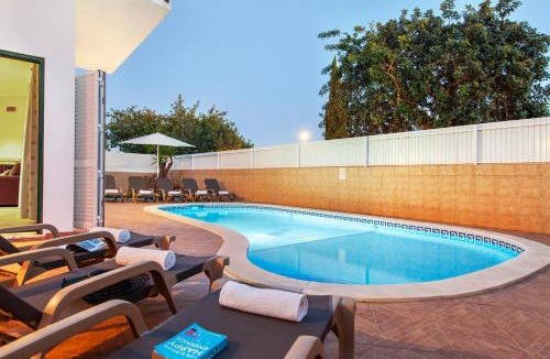 Correeira House | Villa Saona - com BBQ e piscina aquecível em Albufeira