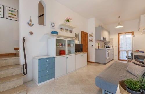 Lido di Spina Apartment | Villa with garden on two levels (ground floor and first floor) with internal stairs.In 70 square meters of space, it comfortably accommodates 6 people with two bedrooms (one with a double bedroom, one with two single beds) and a double sofa bed in the li