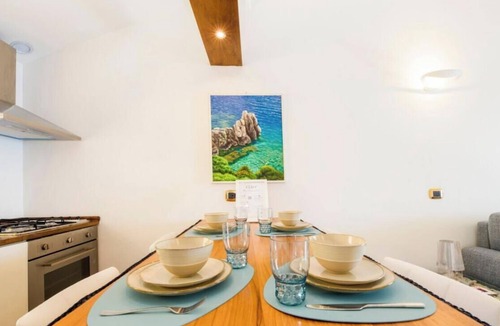 Nervi Apartment | “Vista Mare Genova”A two-level gem with a spectacular sea view, unique in the area.Lower floor: Bedroom with premium-quality mattress, bathroom, and a cozy corner with table and chess set overlooking the sea.Upper floor: Living room with sofa bed, fu