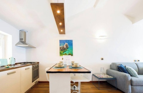 Nervi Apartment | “Vista Mare Genova”A two-level gem with a spectacular sea view, unique in the area.Lower floor: Bedroom with premium-quality mattress, bathroom, and a cozy corner with table and chess set overlooking the sea.Upper floor: Living room with sofa bed, fu