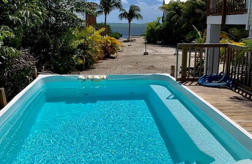 Cudjoe Key House | Yellow Home - Receive 400 dollars towards a BOAT RENTAL!