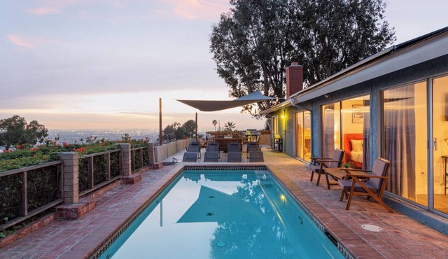 4BR Modern Sunset Home w/Outdoor Deck, Heated Pool & BBQ