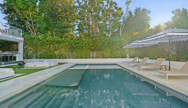 A beautifully maintained traditional style home located in the iconic Beverly Hills Flats
