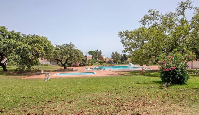 Apartment 'Stunning Modern In Oura' with Shared Pool, Wi-Fi and Air Conditioning