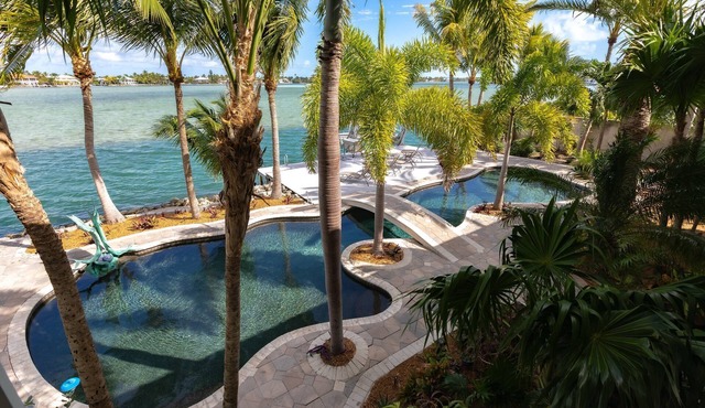 Bayside Beauty: Tropical Paradise 3BR Home, Panoramic Open Water Views, Grotto Pool, Dog-Friendly