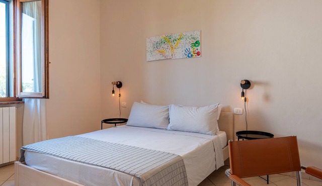 Bed and Breakfast 'Camera 5' with Shared Terrace, Wi-Fi and Air Conditioning