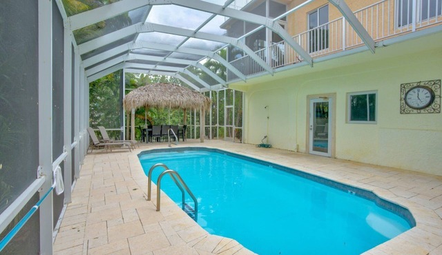 Big Kahuna – an expansive and inviting 5-bedroom, 4-bathroom single-family haven that encapsulates the essence of Florida Keys living