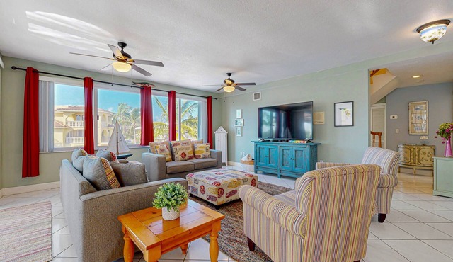 Canal-front, family-friendly home w/soaking tub, dock access & water view