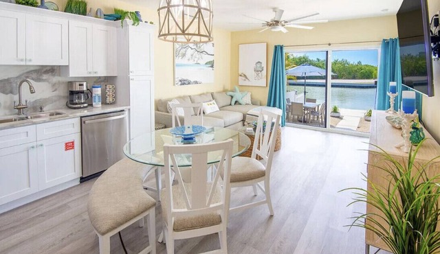 Canal Front w/Hot Tub and Private Dock Cozy Villa near Sombrero Beach