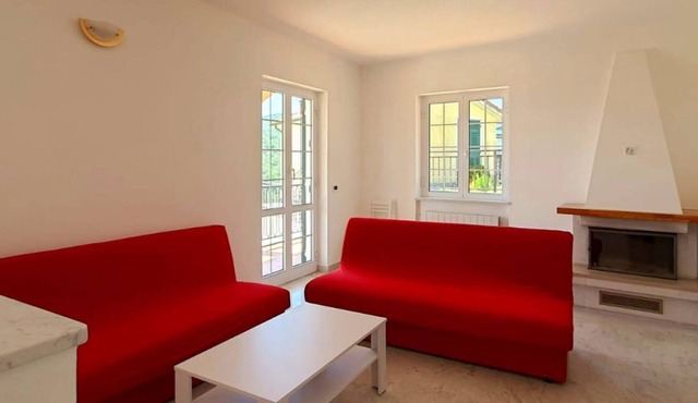 Casa con Ampio Giardino ed Area Bbq, con Vista Mare e Posto Auto