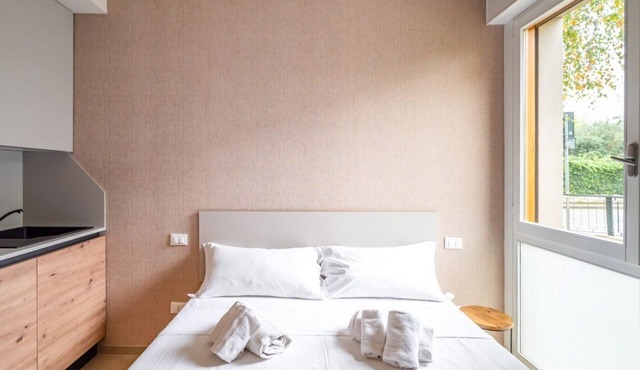 GuestHost - Cosy studio of 17 smq for two people, located on the ground floor of a just renovated building NO lift (there is a step to access the entrance of the flat). The property is located in a quiet and peaceful residential area. In just a few minut
