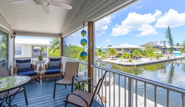 Key Blessing: Experience the Keys Life at This Charming 3BR Canal Front Home, Dockage & Dog-Friendly