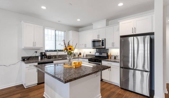 NEW LISTING! Townhouse Retreat with Outdoor Bliss by RedAwning