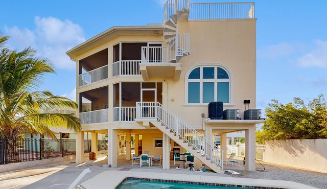 Ocean-view snowbird retreat with private pool, rooftop, lanais, kayak & bikes