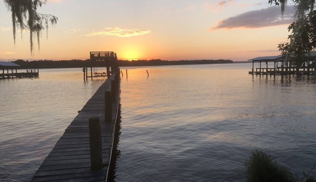 Peaceful Waterfront Home on St. Johns with large porch and dock.