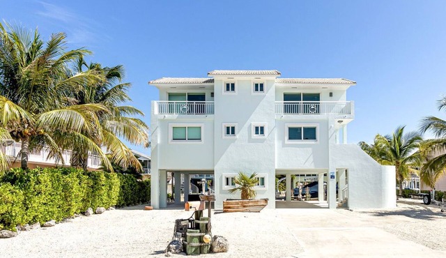 Port Antigua Retreat on Canal with Boat Lift and Private Beach Access