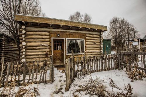 Rustic Log Cabin on Eco-Friendly Farm near Taos, New Mexico in San Cristobal