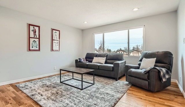 Spacious 4-bedroom house in charming Centennial with AC, WiFi