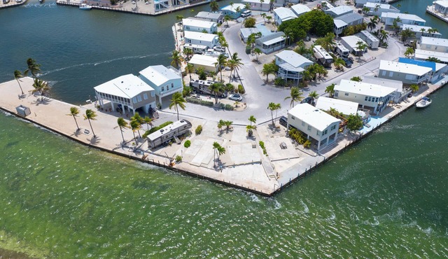 Stunning Open Water RV Lot with 38' Seawall and Great Amenities in Gated Community