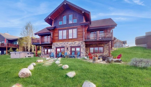 Stunning waterfront home w/beautiful mountain views, private hot tub
