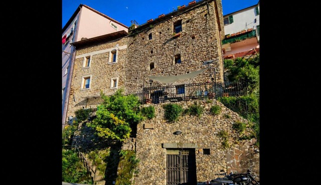 The cozy little house with terrace in the medieval walls