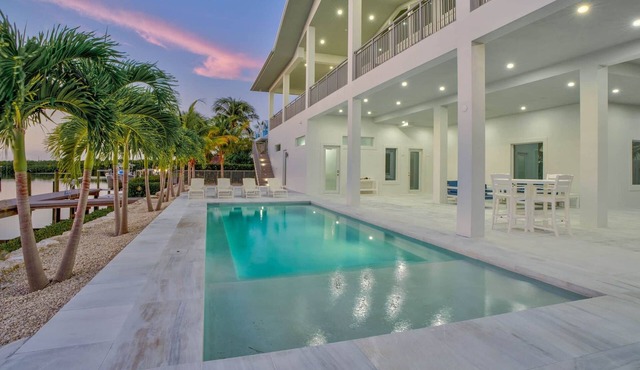 Waterfront Luxury: Pool, Dock & Near Beach!