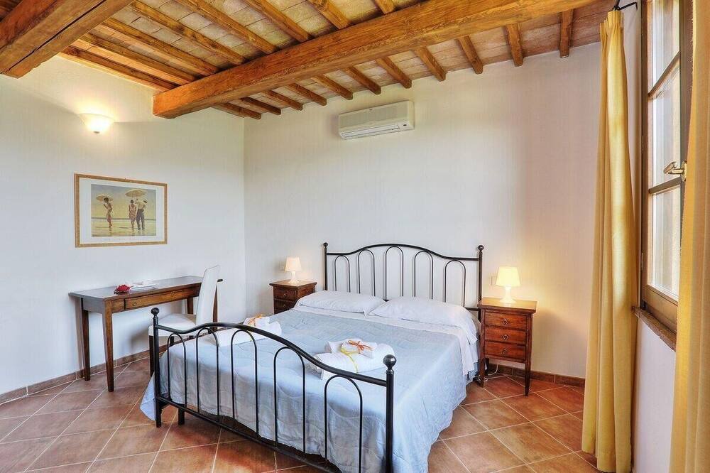 Photo of Bedroom in Montecatini Val di Cecina
