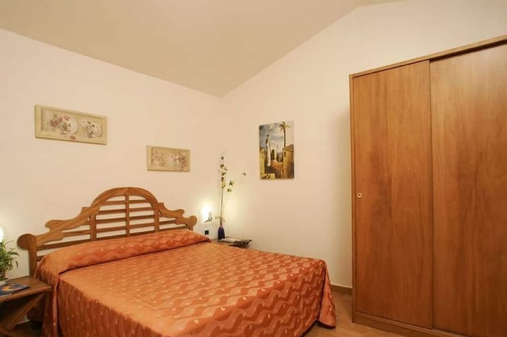 Photo of Bedroom in Talamone