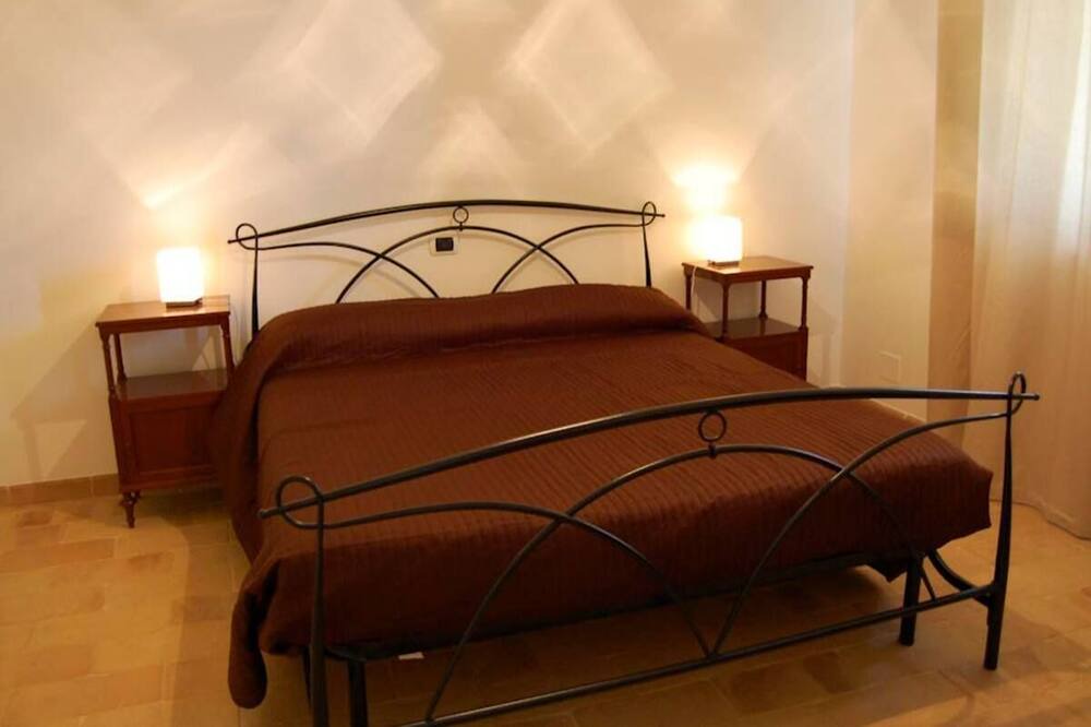 Photo of Bedroom in Grotte di Castro