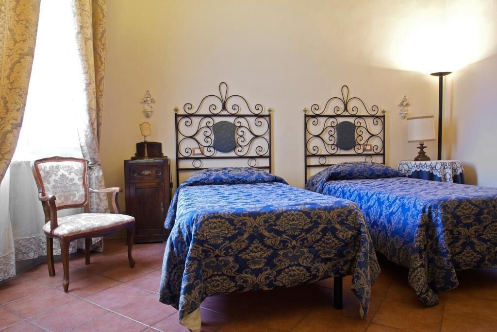 Photo of Bedroom in Siena Historical Center