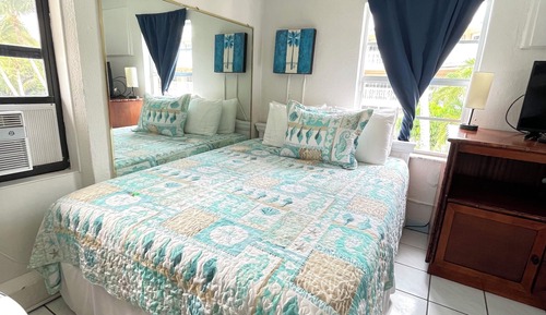 Family Studio Suite, Multiple Beds, Kitchen, Partial Ocean View