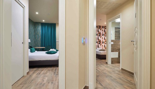 Camera Deluxe Doppia con letto aggiunto