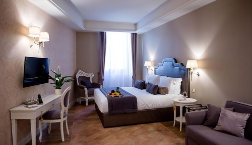 Junior Quadruple Room, 1 King Bed with Sofa bed, City View
